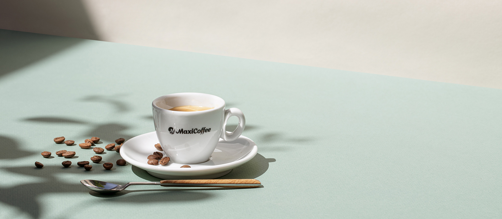 espresso in cup with coffee beans